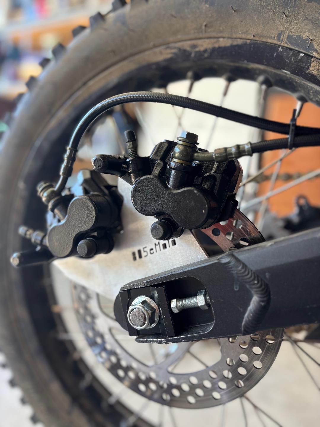 This is the 805moto.com dual caliper bracket designed for the Rawrr Mantis ebike platform